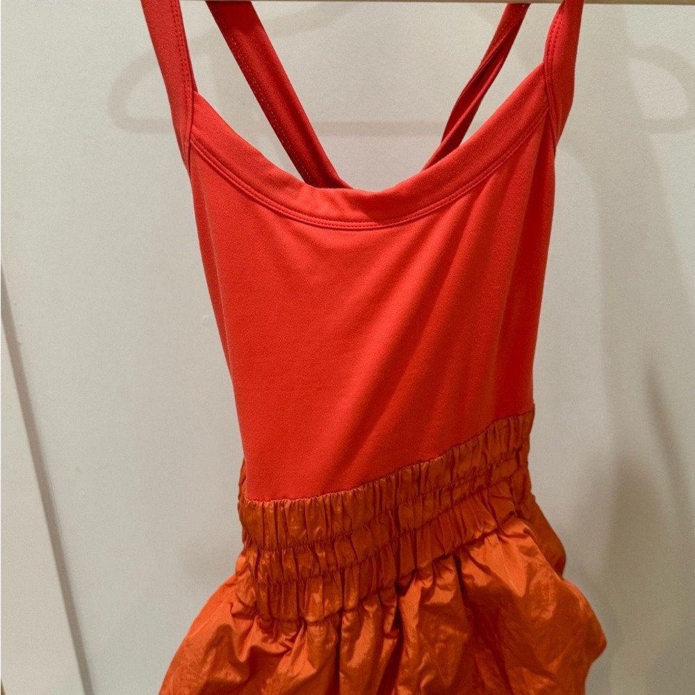 Orange free people runsie romper